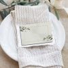 place cards on white plate